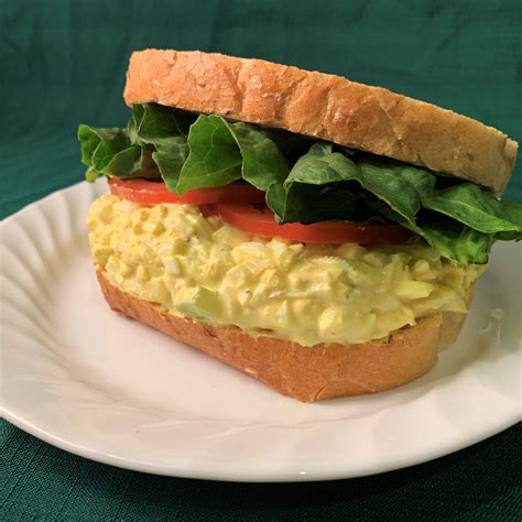 Egg salad sub sandwich with lettuce and tomato