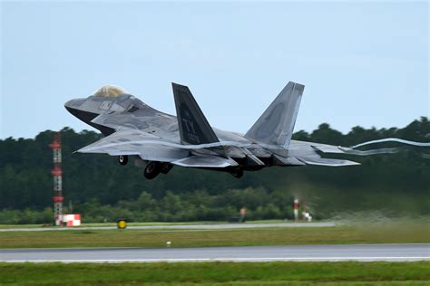 F-22 Raptor taking off at high angle of attack