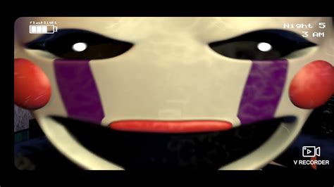 A screenshot of the FNAF animatronic's red eyes