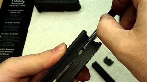 Disassembling the slide of a Glock 19