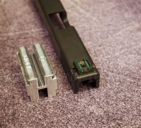 A Glock with the slide lock engaged for maintenance