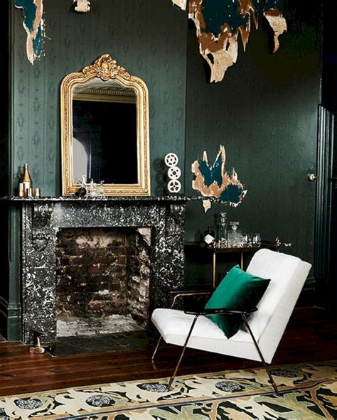 Luxurious living room with gold accents and green walls