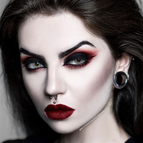 Gothic-inspired makeup looks featuring red and black hues