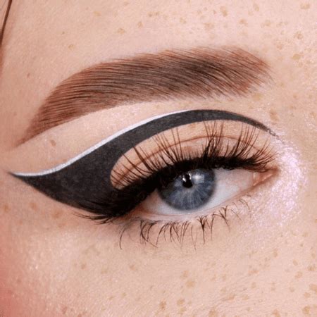 A model with a graphic liner design on her eyelids