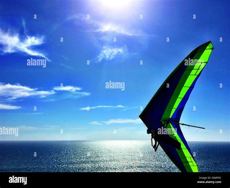 Hang gliding over the ocean