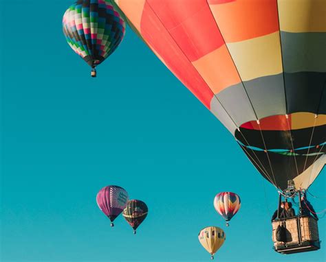 Hot air ballooning over a scenic landscape