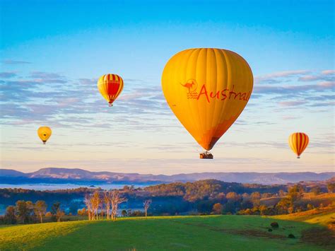 Hot air ballooning over a scenic landscape