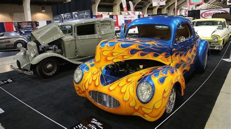 A hot rod on display at a car show