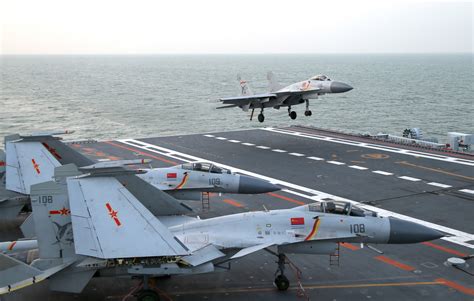 J-15 Fighter Jet taking off from an aircraft carrier