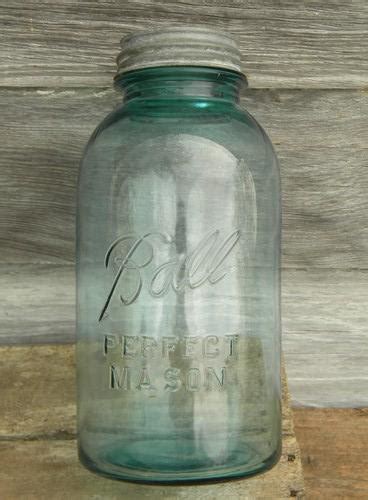 A jar filled with colorful buttons