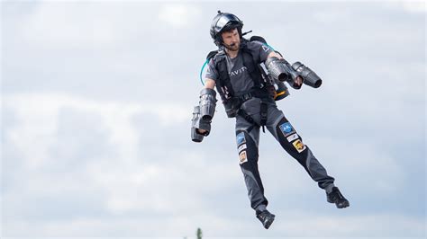 Jetpack flying over a scenic landscape