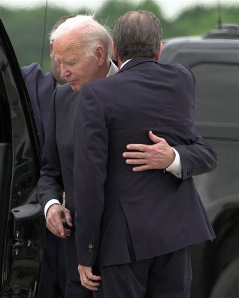 Joe Biden hugging a senator