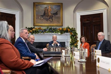 Joe Biden putting his arm around a congressional staffer