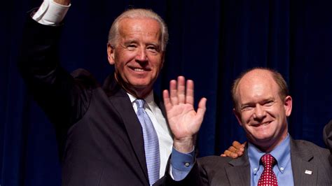 Joe Biden putting his arm around Senator Chris Coons