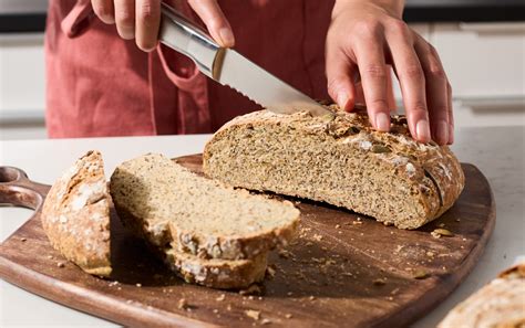 A person kneading dough