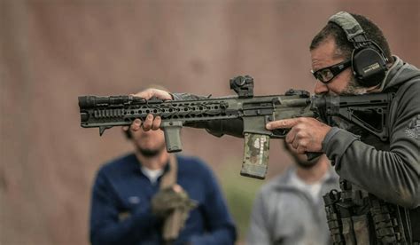 Left-handed shooter in action