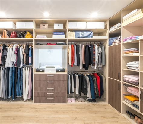 A closet with a light color palette