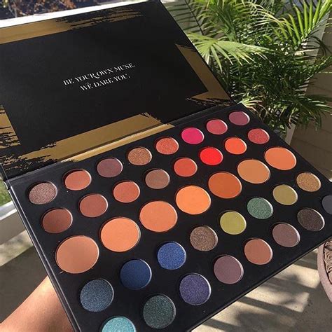 Makeup artist creating eyeshadow palette