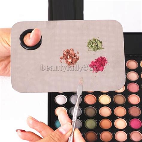 Makeup mixing palette with various shades of foundation