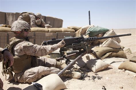 Marine Corps Machine Gunner with M2.50-caliber Machine Gun