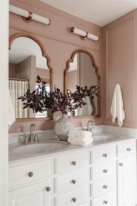 A mauve-colored bathroom with a mauve-colored vanity