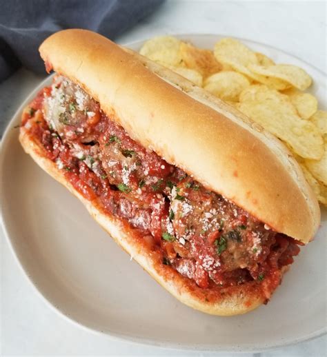 Meatball sub sandwich with marinara sauce and melted mozzarella