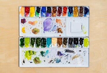 Artist studio with a metal watercolour palette