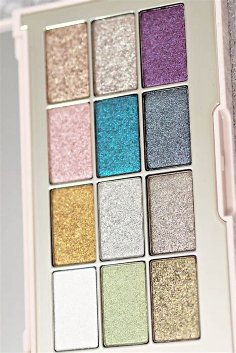 Metallic eyeshadow palette with shades of gold, silver, and bronze