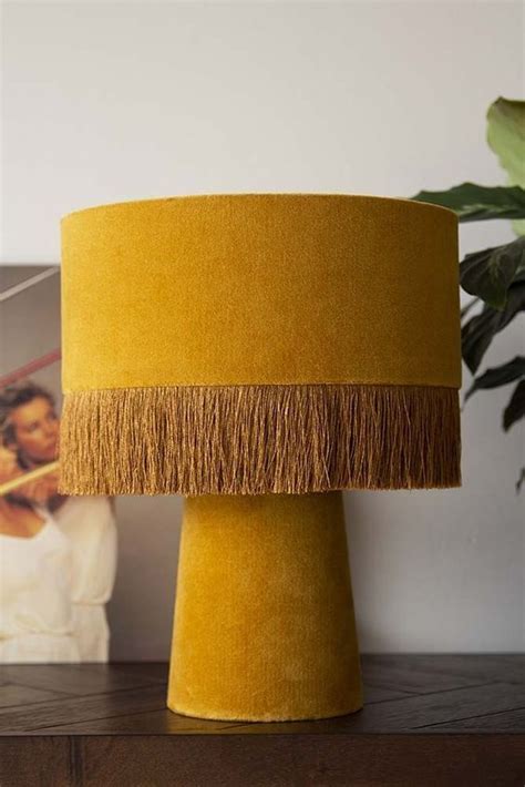 Mustard yellow pendant light in a kitchen