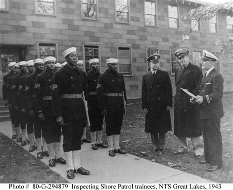 Navy Shore Patrol personnel participating in a training exercise