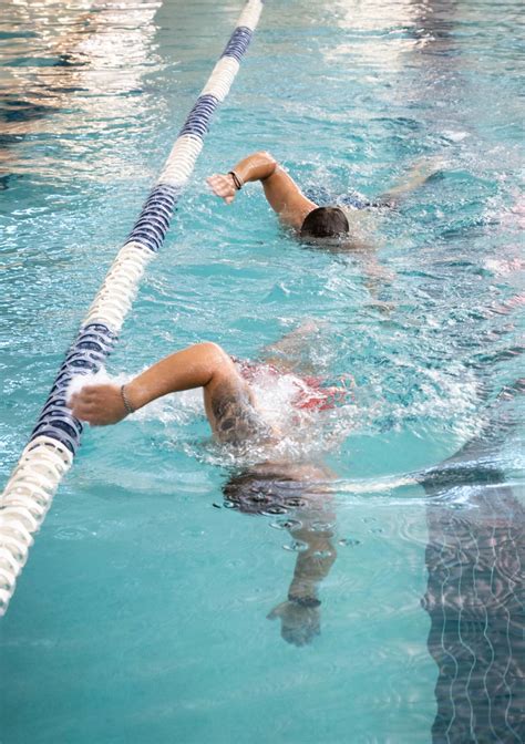 Participants competing in a swimming event