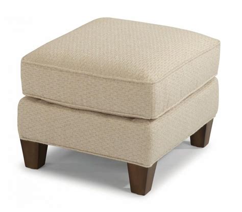 A blow up ottoman with a cushion top