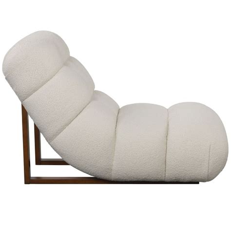 A blow up ottoman used on a patio or outdoor seating area