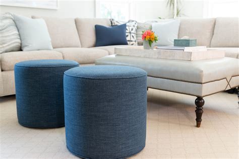 A blow up ottoman used as additional seating in a cozy living room