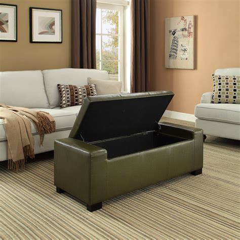 A blow up ottoman used for storage and organization in a bedroom