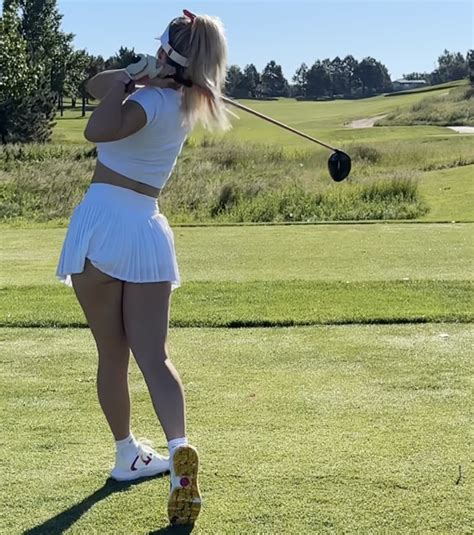 Paige Spiranac golfing