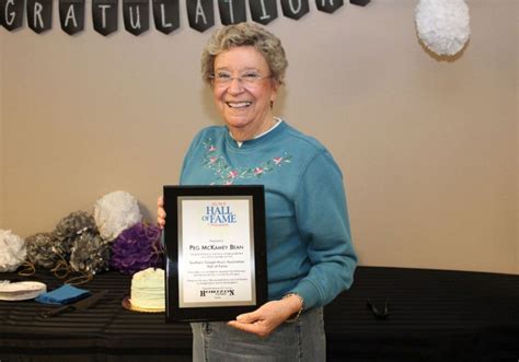 Peg McKamey Bean receiving an award