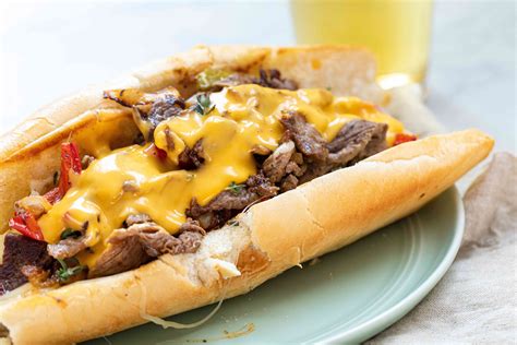 Philly cheesesteak sub sandwich with sautéed onions and bell peppers