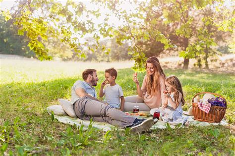 A family picnicking at Cemetery Point Beach