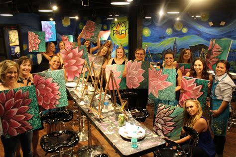 Joining a painting class with friends or family at Pinot's Palette CDA