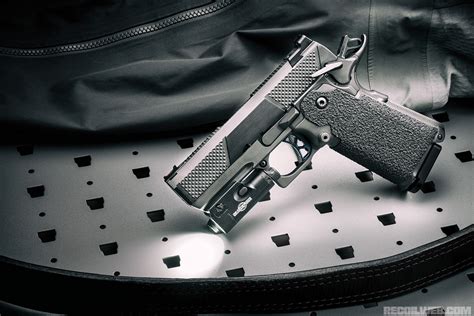 A police officer training with their standard issue pistol