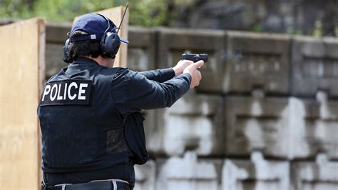 Police officers at a shooting range