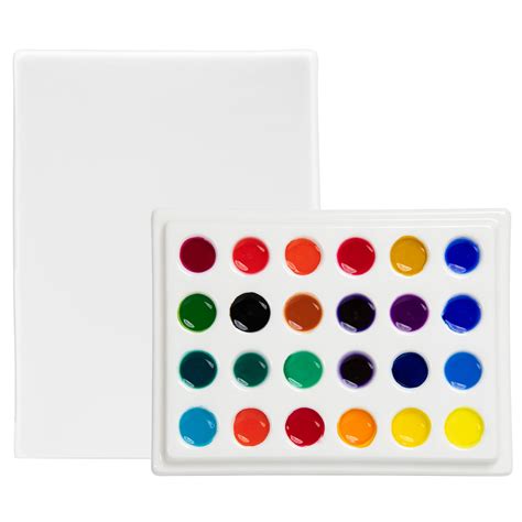 A porcelain paint palette with various colors of paint