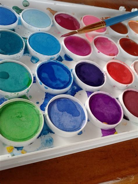 A porcelain paint palette with expressionist art