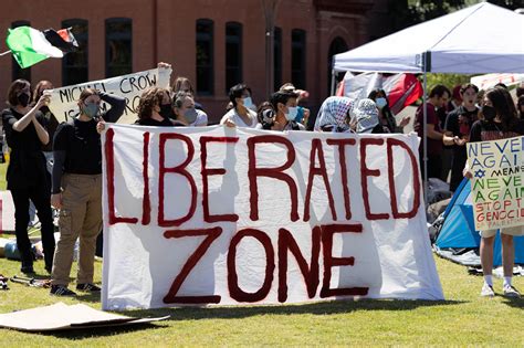 Protesters outside the stadium