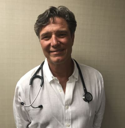 Robert Kaufmann, MD, using telemedicine