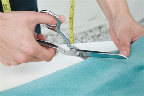 Scissors Cutting Fabric