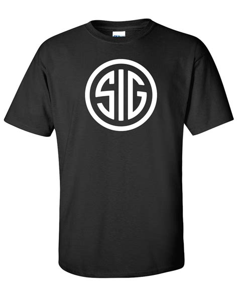 Man wearing a Sig Sauer cap with a graphic t-shirt