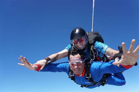 Skydiving over a scenic landscape