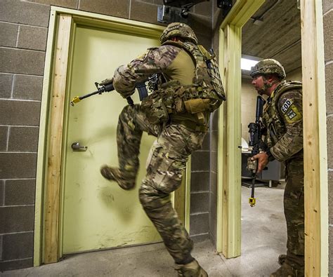 Soldier with gun in urban warfare